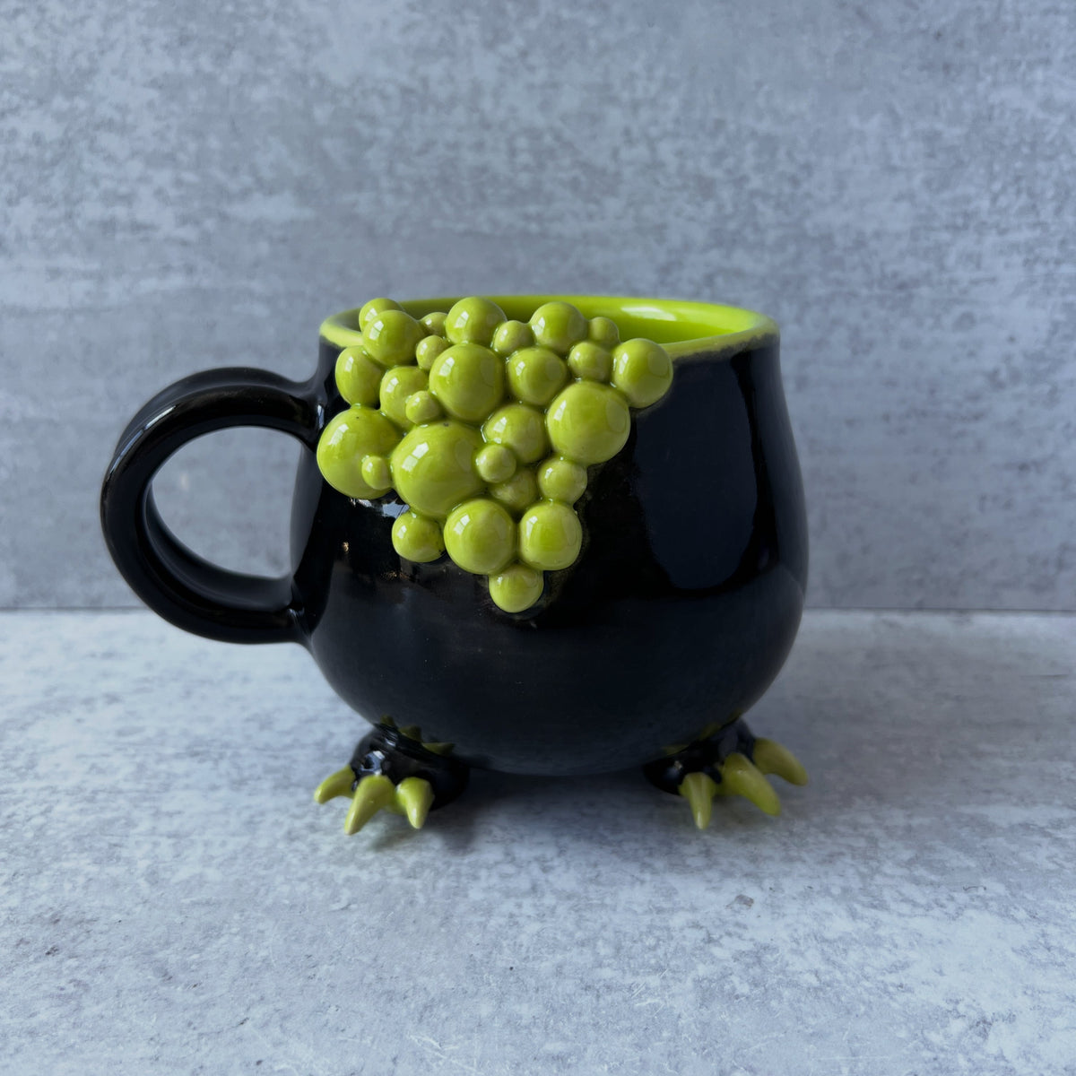 Cauldron Mug Black with Lime Bubbles and Claws