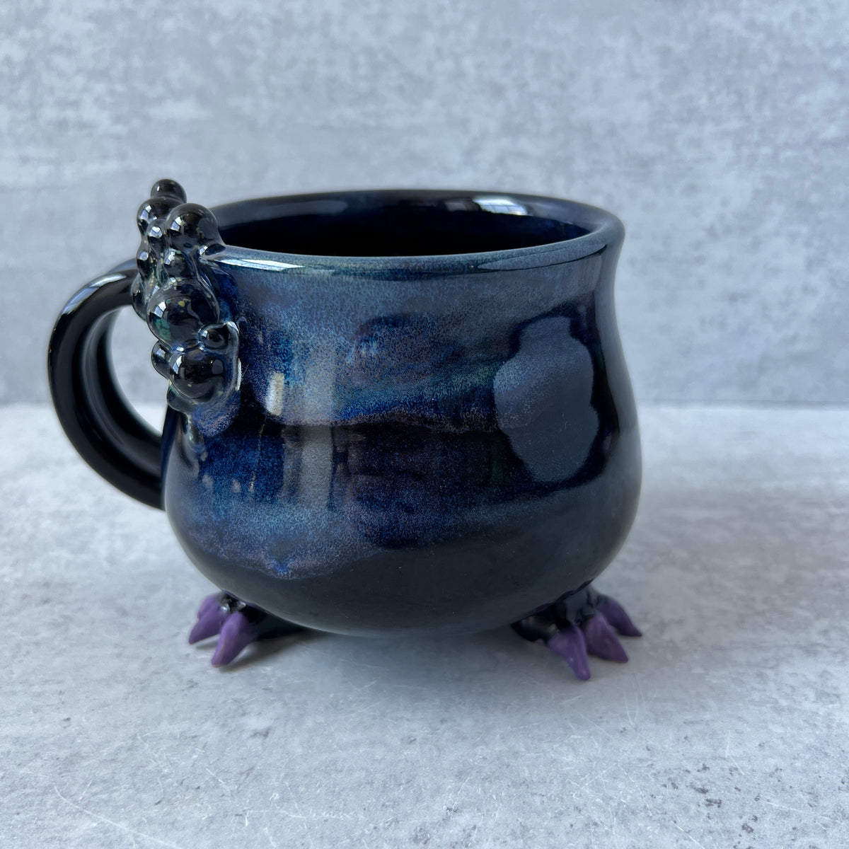 Cauldron Mug Black and Blue with Purple Claws