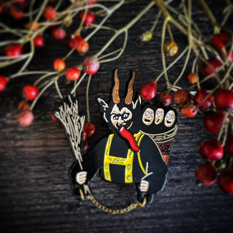 Krampus 2" Soft Enamel Pin with Spinner tongue and attached chain.