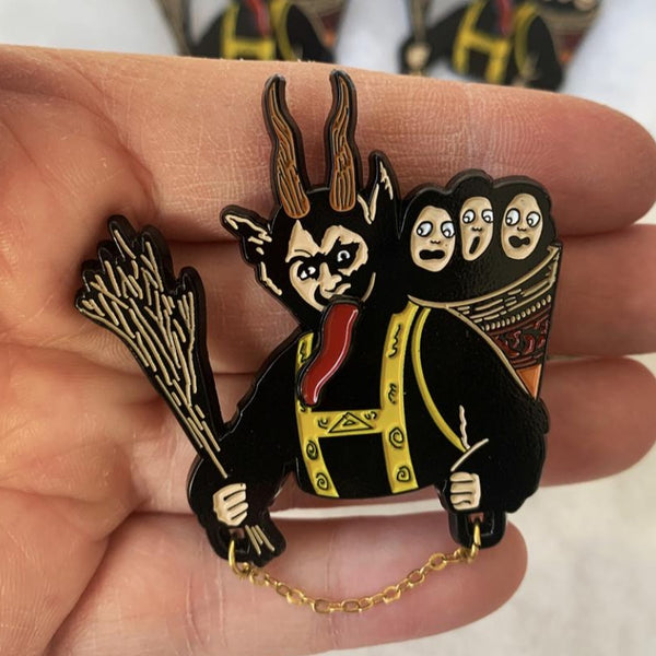 Krampus 2" Soft Enamel Pin with Spinner tongue and attached chain.